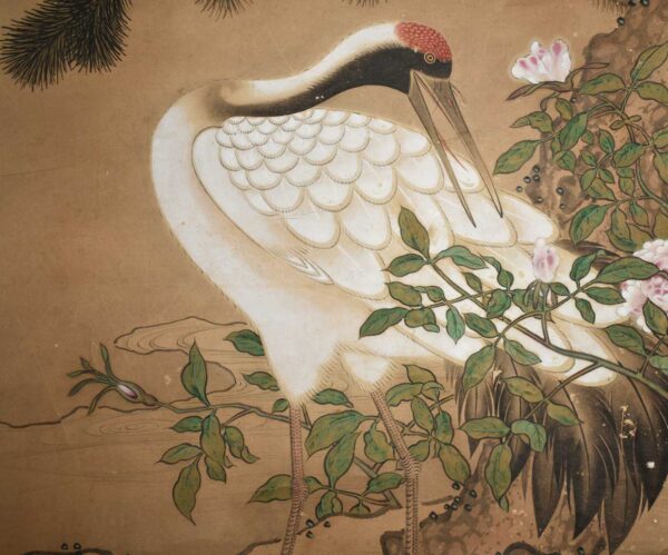 Hanging scroll painting on paper. Crane under pine tree.